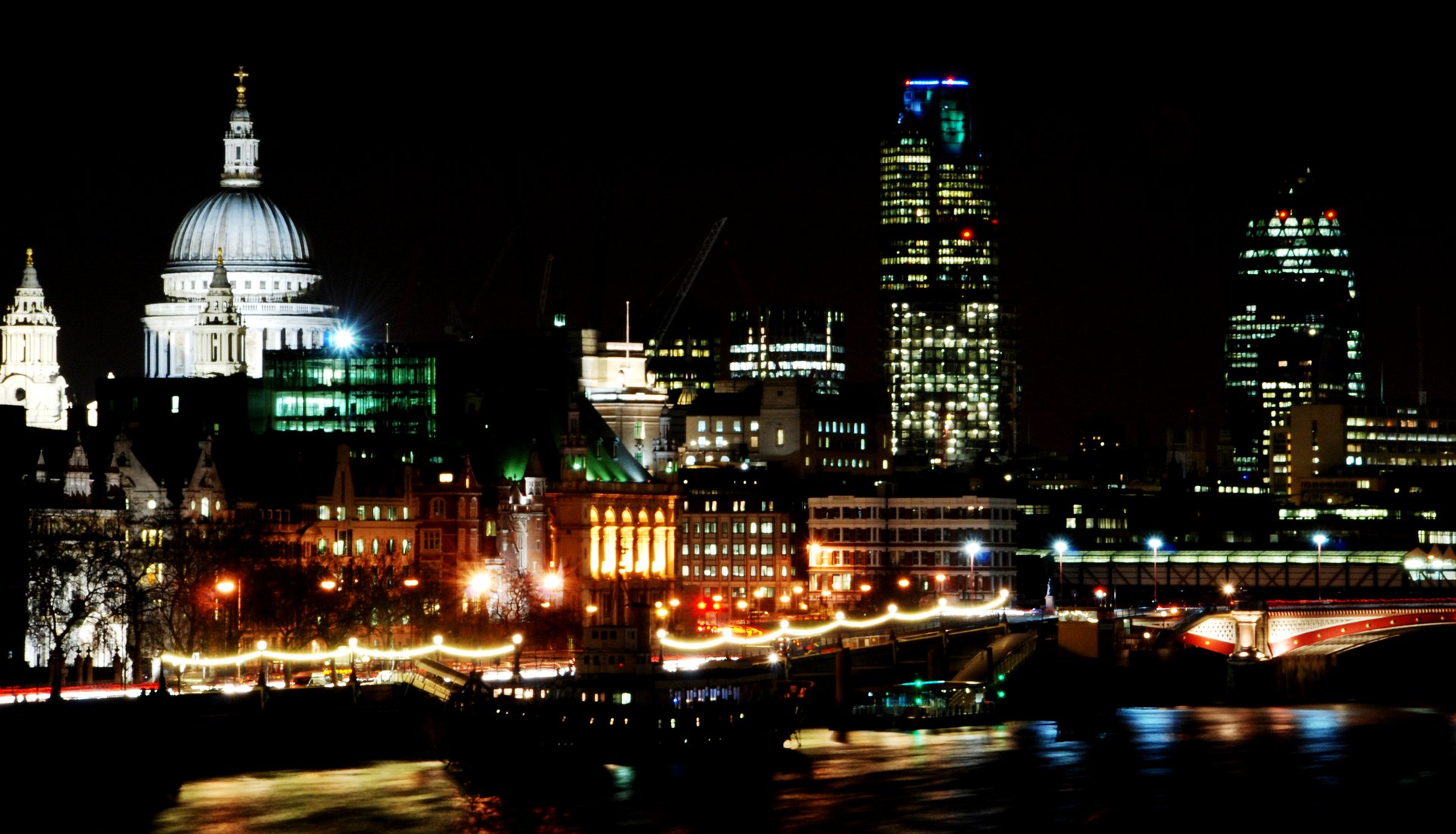 London skyline over the River Thames at dusk